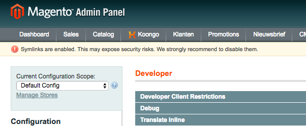 Magento admin screen with Symlinks enabled warning notification. 